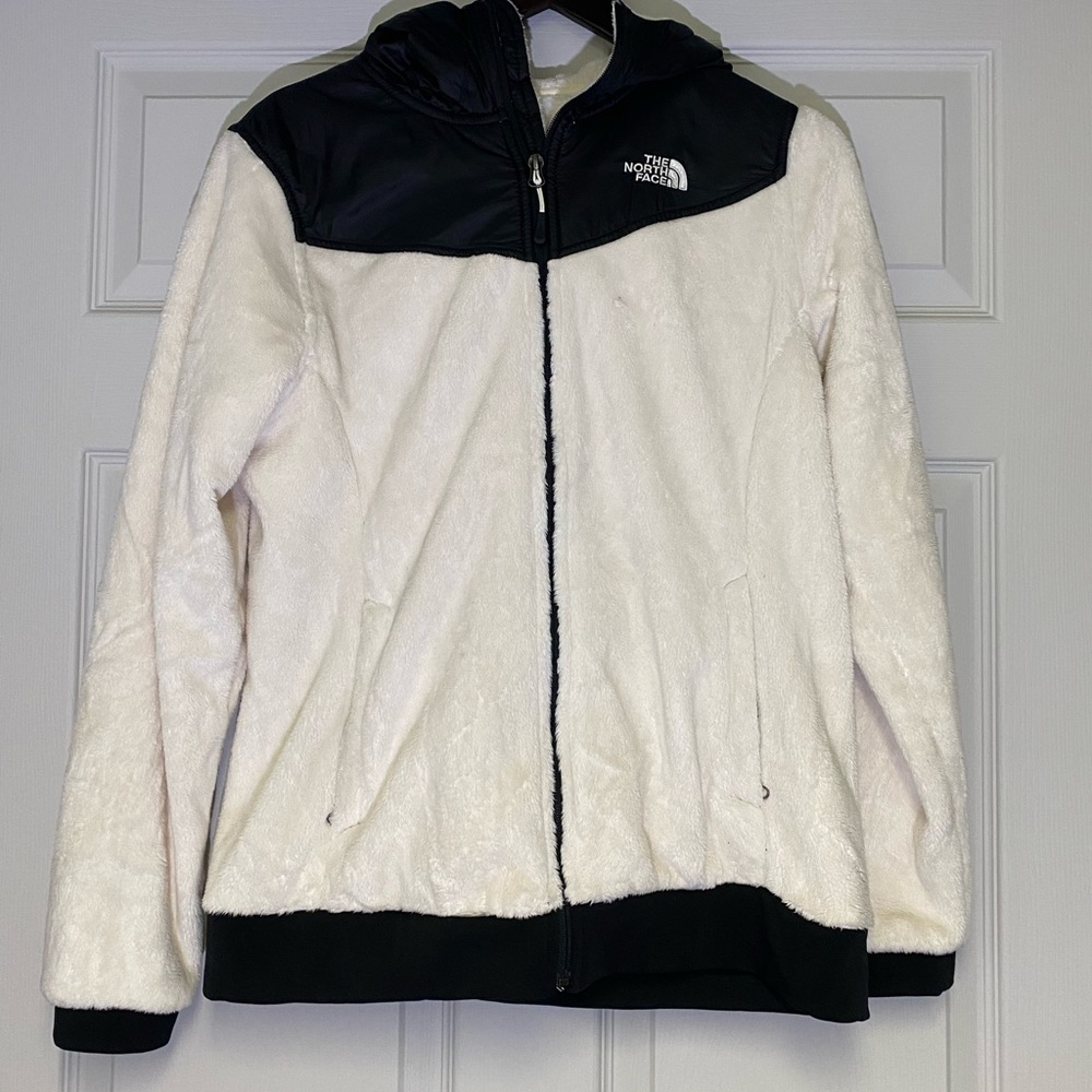 The North Face cream fuzzy zip up with black detailing